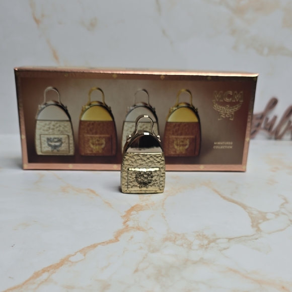 MCM Accessories - MCM ultra mini deluxe new necklace refill or travel new